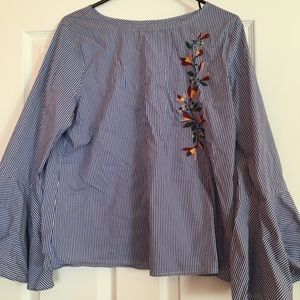 Embroidered blouse with flare sleeves